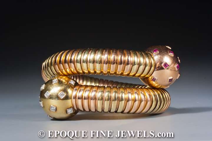 An exquisite two-colored gold tubogas bracelet with ball terminals